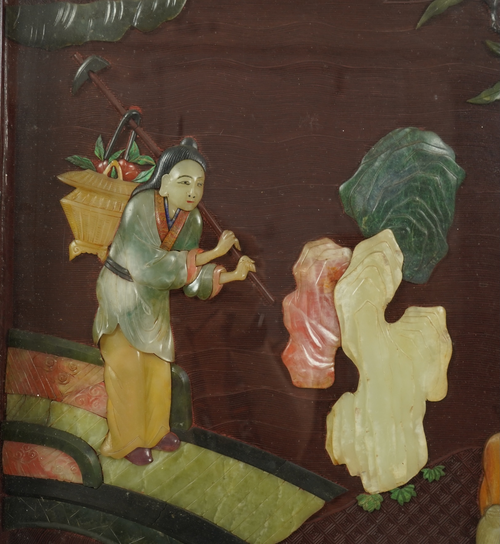 A Chinese carved cinnabar lacquer and hardstone mounted panel, early 20th century